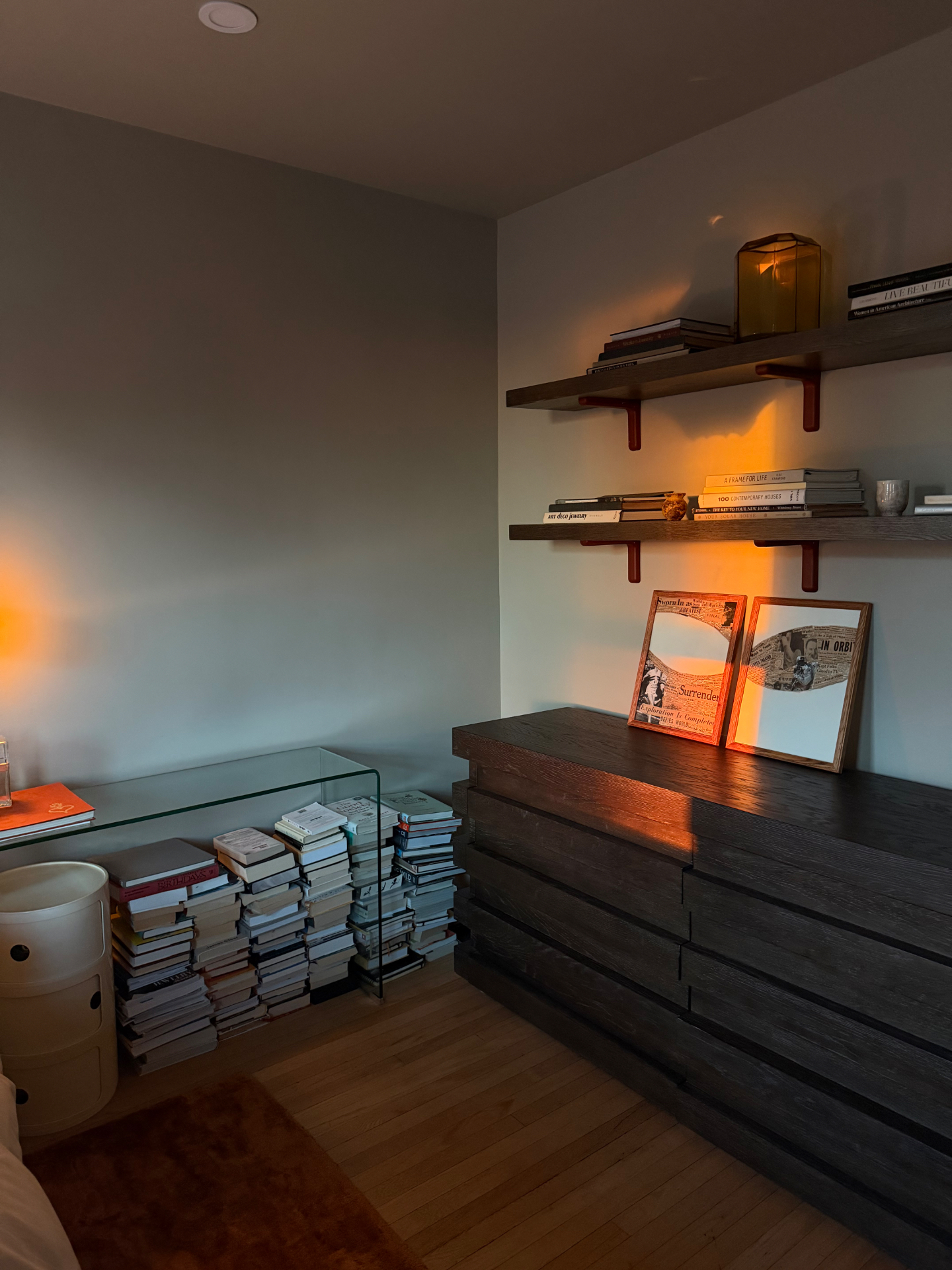 The room at dusk with the pieces on the credenza